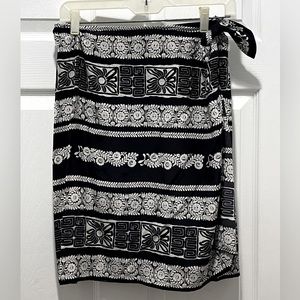 Neiman Marcus black and white floral printed silk wrap skirt.